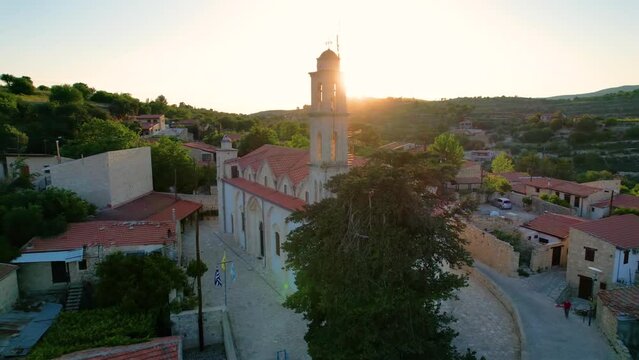 Aerial circle around church in lofou village troodos mountains cyprus