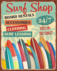 Surf Board Shop vintage metal sign with surfboard lines up on  beach.