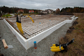 Reinforcement of foundation slab of private house. Preparation for pouring concrete foundation for...