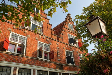 The external facade of Vrouwenhofje (built in 1682), a historical house located along Munnickenveld street in the city center of Hoorn, West Friesland, Netherlands
