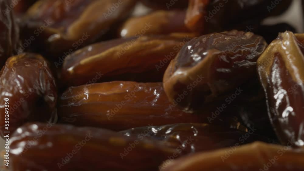 Poster a bunch of dried dates rotate in a circle