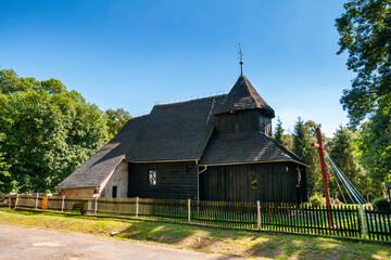Fototapeta na wymiar Wooden church of the Holy Trinity, Baldwinowice, Opole Voivodeship, Poland 