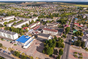 aerial panoramic view from a great height of a small provincial town with a private sector and high-rise apartment buildings