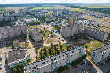 aerial panoramic view from a great height of a small provincial town with a private sector and high-rise apartment buildings