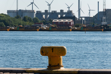 yellow mooring bollard number 1 next to a river in Copenhagen, Denmark