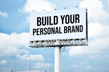 Build Your Personal Brand text message on signboard with blue sky