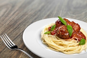 Pasta Spaghetti in plate with sauce, italian cuisine dish.