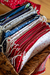 Some cloth masks in wooden baskets and concept