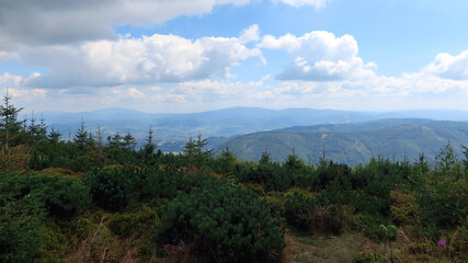 Mountain landscape. Silesian Beskids. One of the Beskids mountain ranges in Outer Western Carpathians in southern Silesian Voivodeship, Poland. Tatras peaks silhouettes in the distance