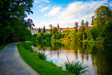 Fototapeta na wymiar View of Pruhonice castle from the pond in a castle park, Czech Republic 