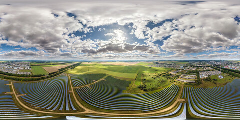 full seamless aerial spherical hdri 360 panorama view over farm field of solar panels with overcast...