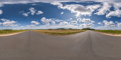 full seamless spherical hdri 360 panorama view on no traffic asphalt road among fields with...