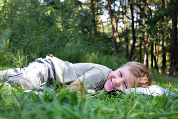 child relaxing in the park
