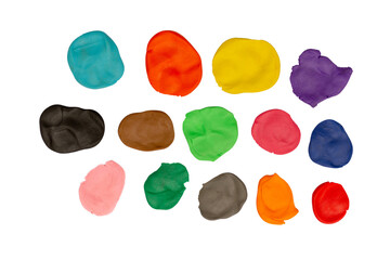 Colorful plasticine is pressed flat.
