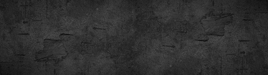 Old aged damaged cracked grunge black anthracite gray dark concrete cement plaster facade wall...