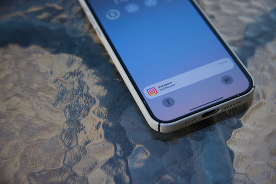Close up of iPhone 12 Pro Max with Instagram Notification on Lock Screen