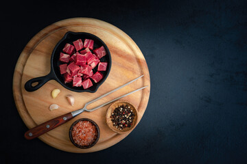 meat diced in a cast iron pan