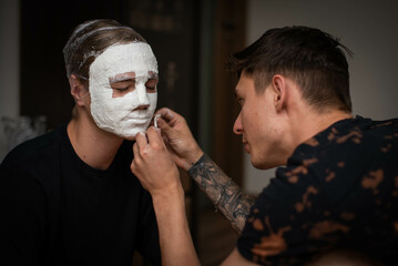 The process of making a plaster mask at home. creating masks based on a plaster cast. Gypsum mold. Cast of the face. Sculpting. The workflow of the artist.