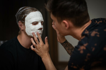 The process of making a plaster mask at home. creating masks based on a plaster cast. Gypsum mold. Cast of the face. Sculpting. The workflow of the artist.