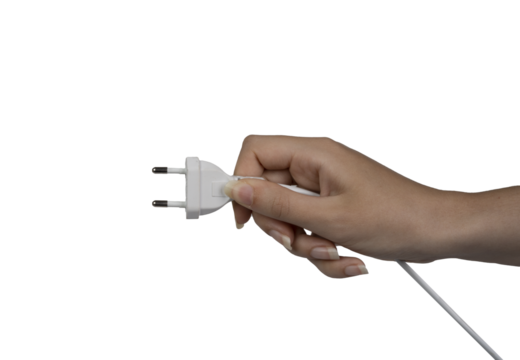 the electric plug in the female hand on an isolated background