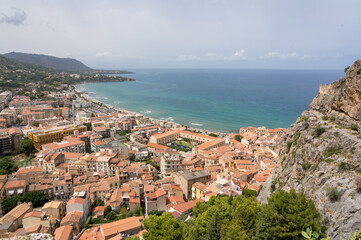 Naklejka na ściany i meble Aerial view of the majestic city of Cefalu in Sicily, southern Italy.