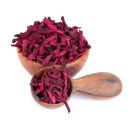 Dry beetroot in wooden bowl and spoon, isolated on the white background. Chopped dried beet.