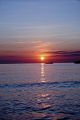 Obraz premium Sunrise with boat ship. West Bali, Indonesia