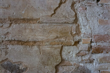 close up detail shot of ancient brick wall of old temple in the museum. A close-up view the old 11th-century brickwork of the temple