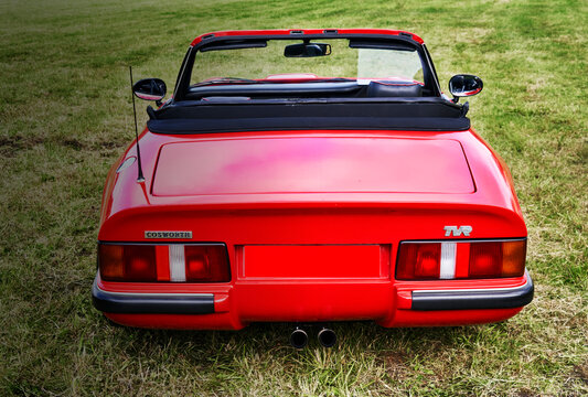 Cosworth TVR sports car, rear view of the red English bolide as a convertible with right-hand drive in Lehnin, Germany, September 11, 2022