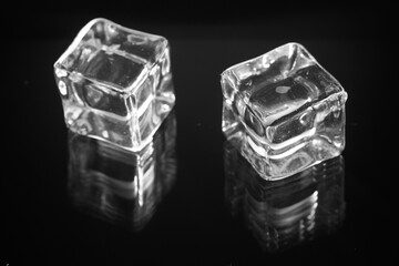 ice cubes on the glass background