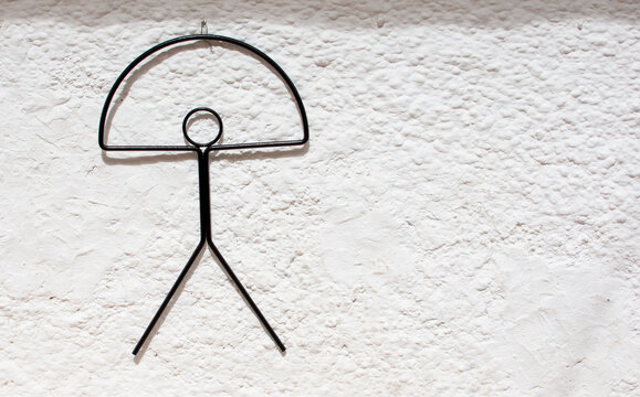 Traditional Indalo symbol on a wall in Mojacar, Almeria, Andalusia, 