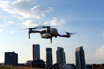 Drone is flying in the sky - Powered by Adobe