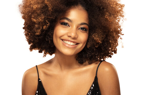 Portrait of happy smiling beautiful african girl with afro hair