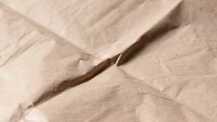 Arrugas en bolsa de papel color cartón