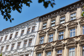 Old facade of old style building before and after renovation