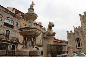 Fototapeta na wymiar renaissance (?) fountain (quattro fontane) in taormina in sicily (italy)