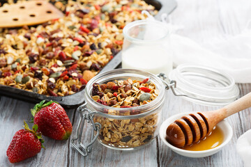 Homemade Gluten Free Oatmeal Granola for Healthy Breakfast on White Table.
