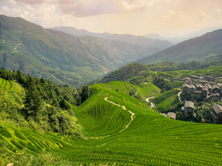Winding roads on the hills between the mountains. China.