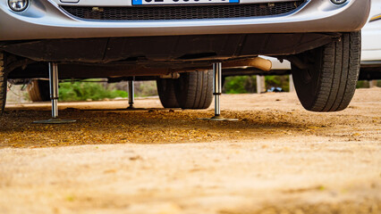 Caravan leveling support leg in use.
