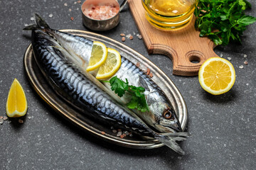 marinated mackerel or herring fish with salt, lemon and spices. Seafood concept. top view