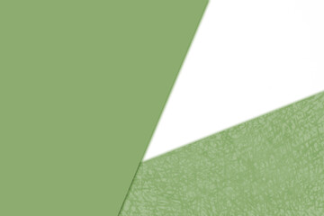 Plain vs textured bright fresh shades of yellow green cream and white color papers intersecting to form a triangle shape for cover design