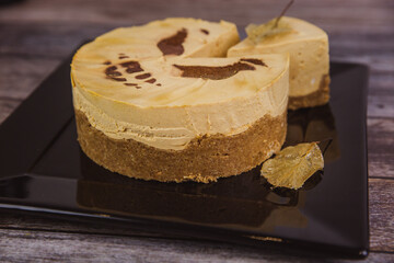 Halloween pumpkin cheesecake scary old jack-o-lantern with piece cut off