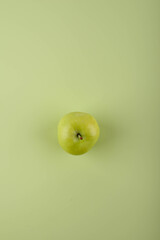 Green apple grape on green background.