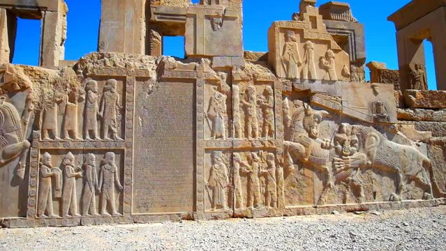The ancient relief on the facade of ruined Xerxes Palace in Persepolis archaeological complex, Persepolis.