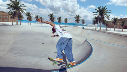 Skateboarder doing a trick in a skate park