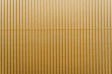 Bronw lgiht brown gold bej  color design of corrugated paper, cardboard. The template for placement of text. Blurred close-up. Also can be used as background and example of texture