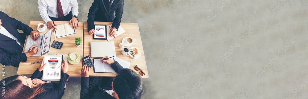 Wall mural Banner top view business people meeting together at office desk in conference room. Panorama Team business meeting partnership plan brainstorm together. Team Collaborate partner group with copy space