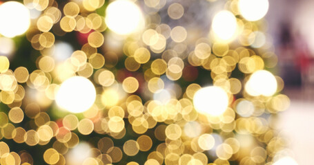 Blurred background golden glitter shiny sparkling banner. Happy Holidays background for template on christmas card brochures posters. Gold bokeh template for digital presentation slideshow background