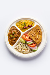 Indian mini meal parcel platter, combo thali with Rajma Masala, roti, dal tadka, jeera rice, salad - obrazy, fototapety, plakaty