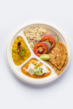 North Indian mini meal, parcel platter or combo thali with paneer butter masala, roti, dal and rice